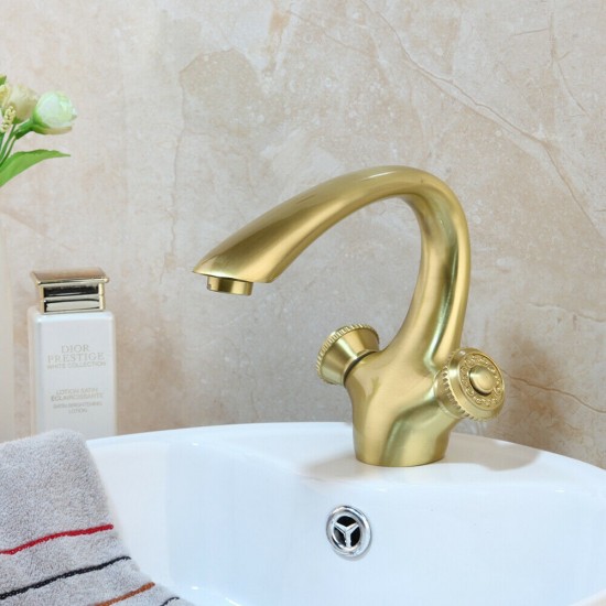 Geborstld gouden kraan met ronde bedieningshendels